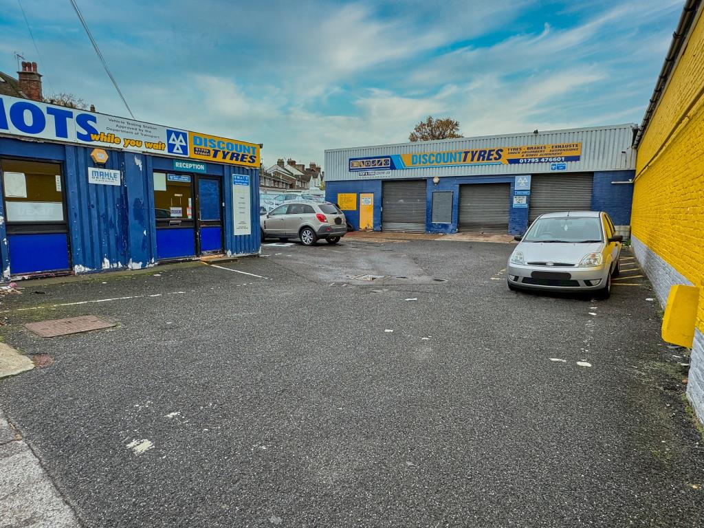 Lot: 58 - FREEHOLD CAR GARAGE/MOT CENTRE - Forecourt with parking, office and workshop